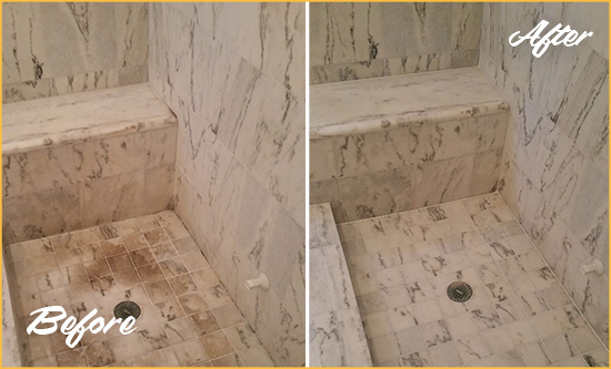 Before and After Picture of a Walls Marble Shower Honed to Remove Dark Stains