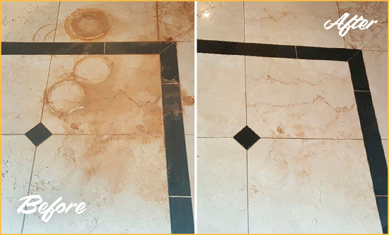Before and After Picture of a Walls Hard Surface Restoration Service on a Marble Floor to Eliminate Rust Stains